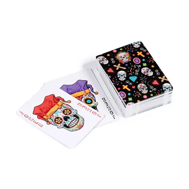 Playing cards with colorful skull design on a white background