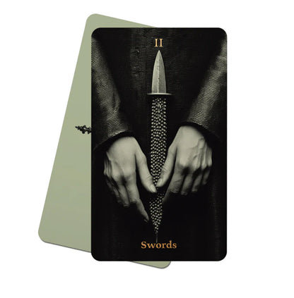 Tarot Obscuro Mini Edition indie tarot deck with black matte edges and metal storage tin.