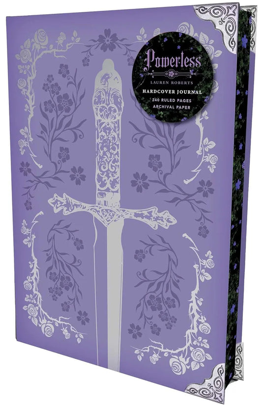 Purple book with floral design and 'Powerless' by Lauren Roberts on the cover. Stencilled edges