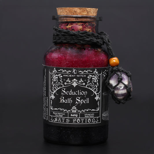 Bottle of 'Seduction Bath Spell' bath potion with decorative elements on a dark background