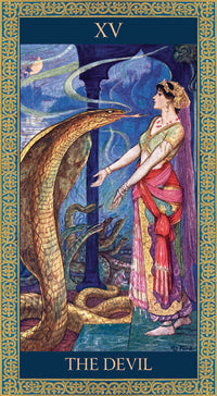 The devil card from the tarot of tales and legends deck . Featuring a princess in classical indian dress facing a large cobra snake 