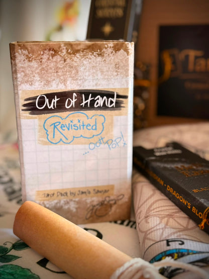 Out of Hand Revisited Tarot special 82-card edition with alternate Fool, Wheel and World cards, The Study card, new card backs, gold-gilded edges and magnetic box.