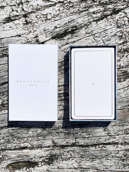 Death Doula Oracle Cards featuring original analogue 35mm photography with double exposure imagery, gold gilded edges and a guidebook for spiritual transformation and healing.