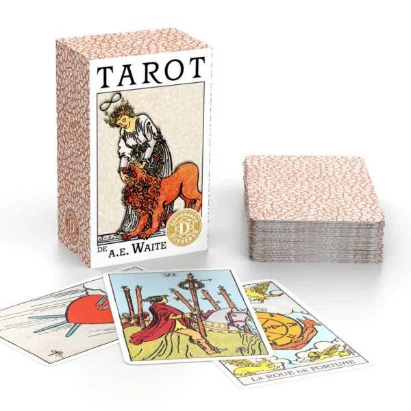 Tarot card set with deck, box, and cards displayed on a white background