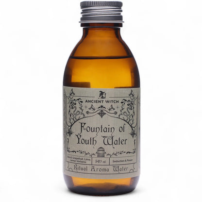 Amber bottle labeled 'Fountain of Youth Water' by Ancient Witch on a white background