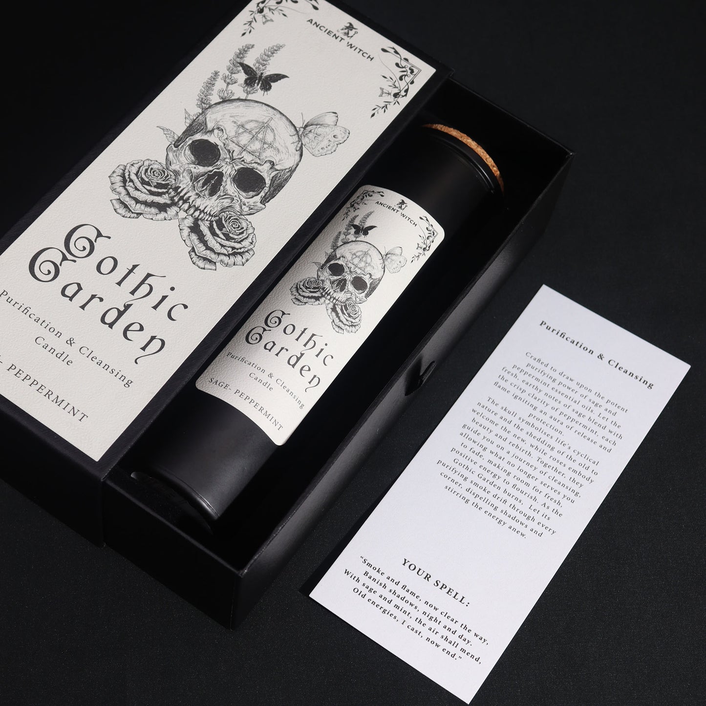 Gothic Garden candle packaging with skull design on a black background
