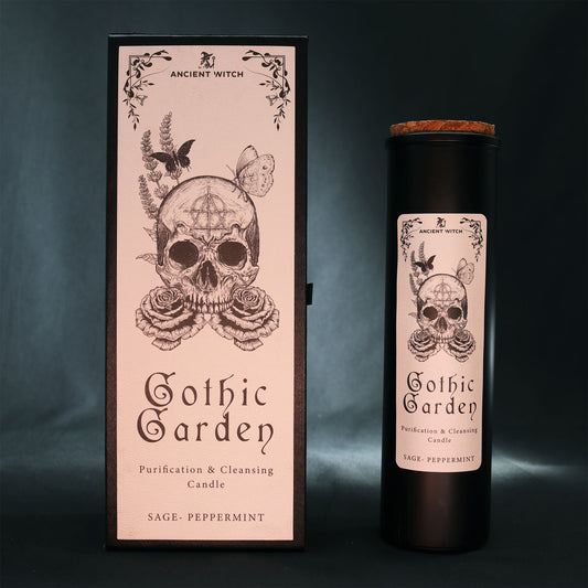 Gothic Garden candle packaging with skull design on a dark background