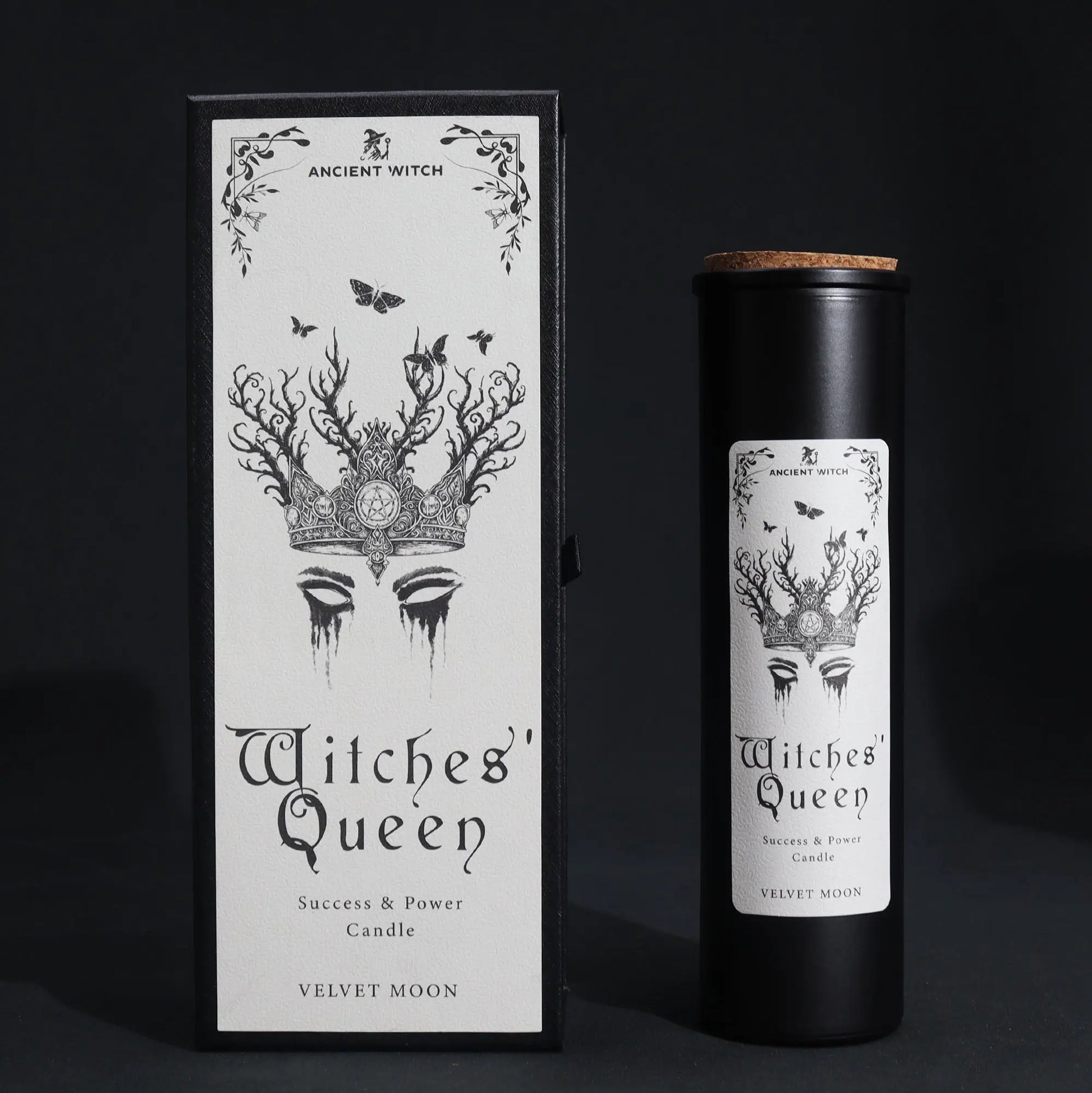 Witches' Queen candle packaging with black and white design on a dark background