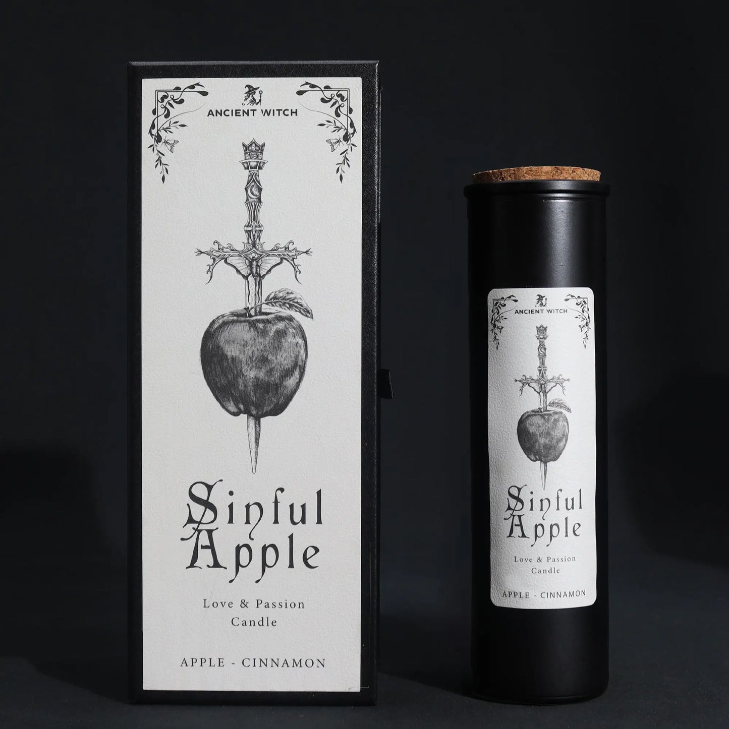 Candle packaging for 'Sinful Apple' with black and white design on a dark background