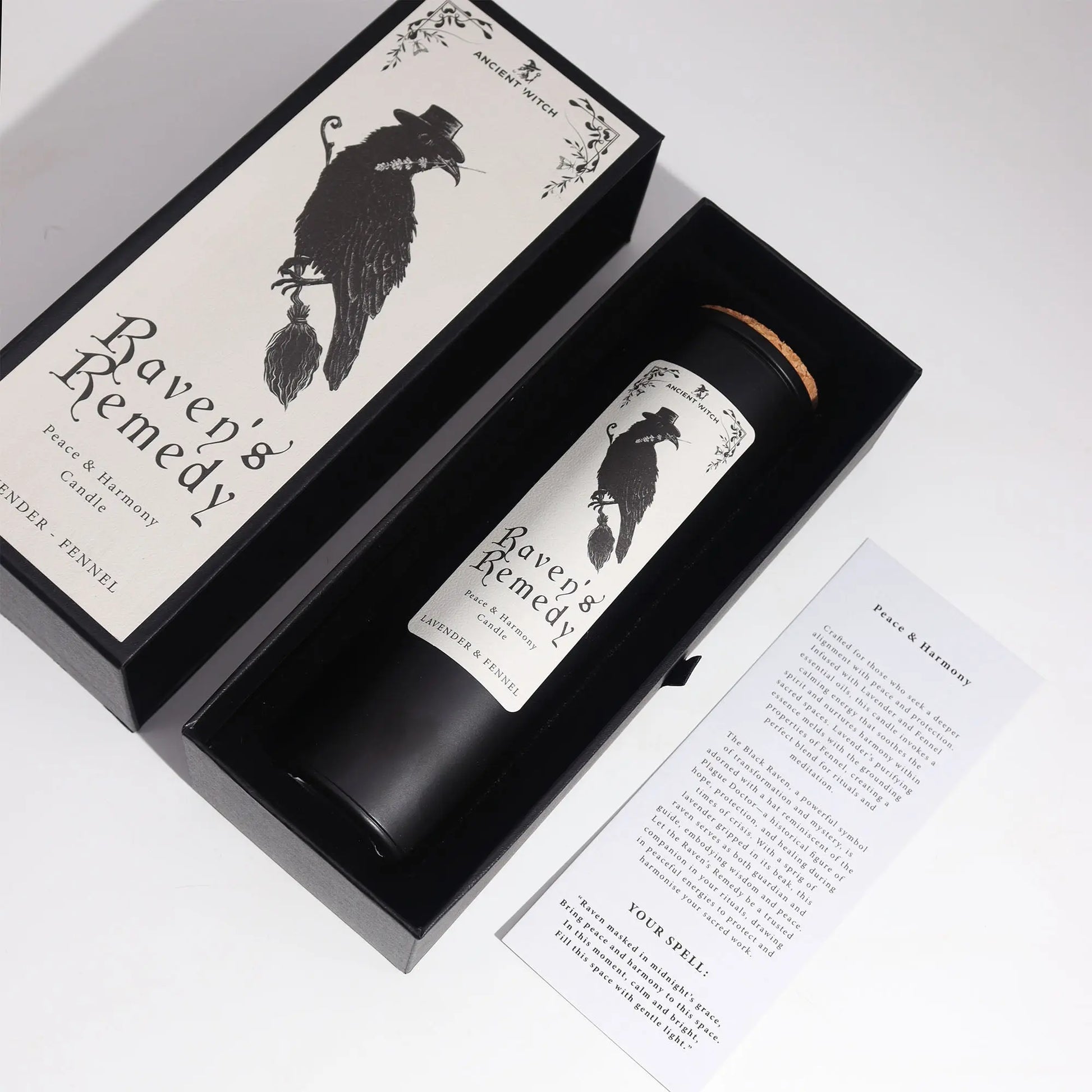 Candle labeled 'Raven's Remedy' in a decorative box on a white background
