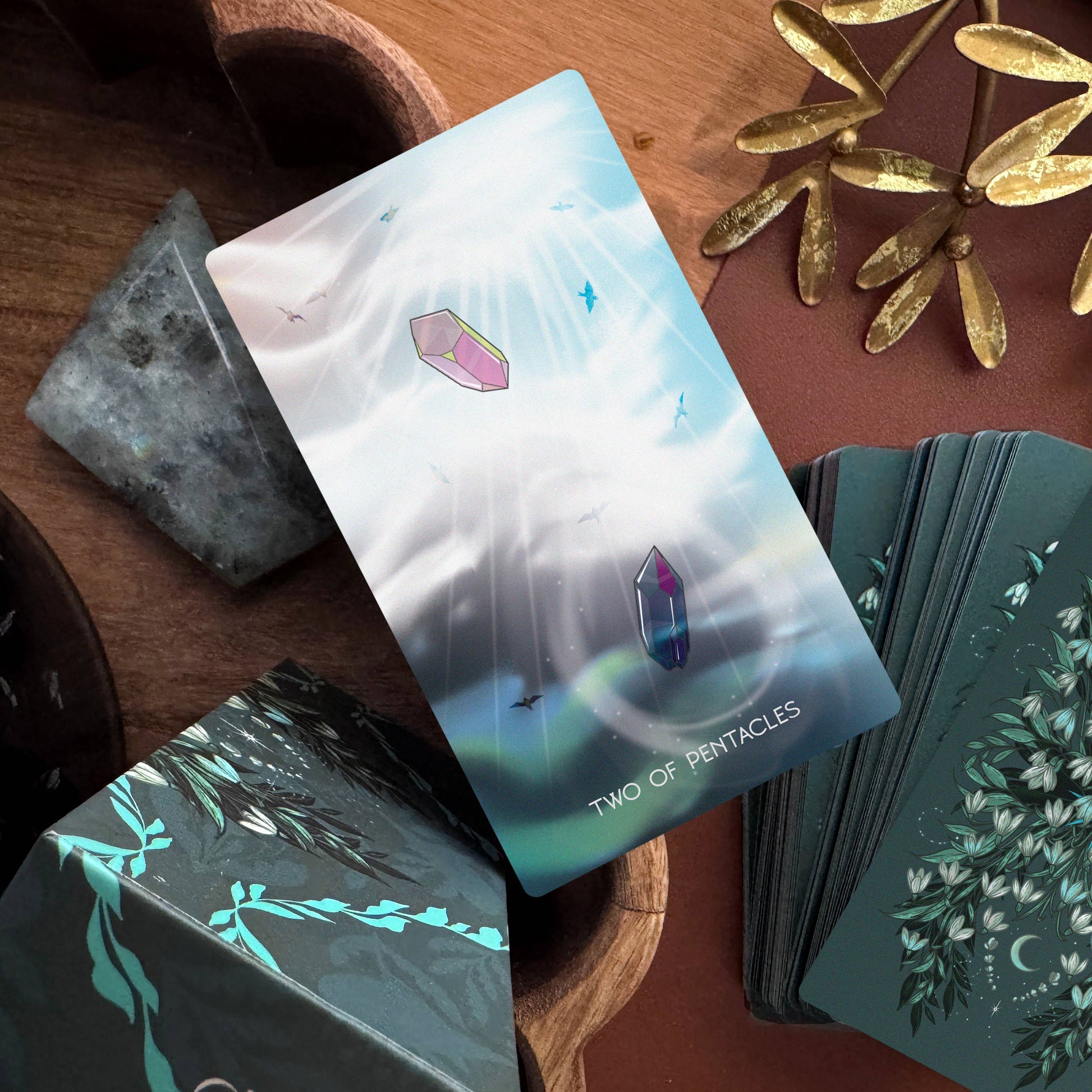 The Meraki Tarot 5th Edition by Kerri Snook featuring whimsical botanical tarot artwork and fantasy-inspired symbolism