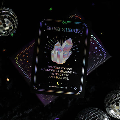 Card with crystal design and text on a dark background with disco balls