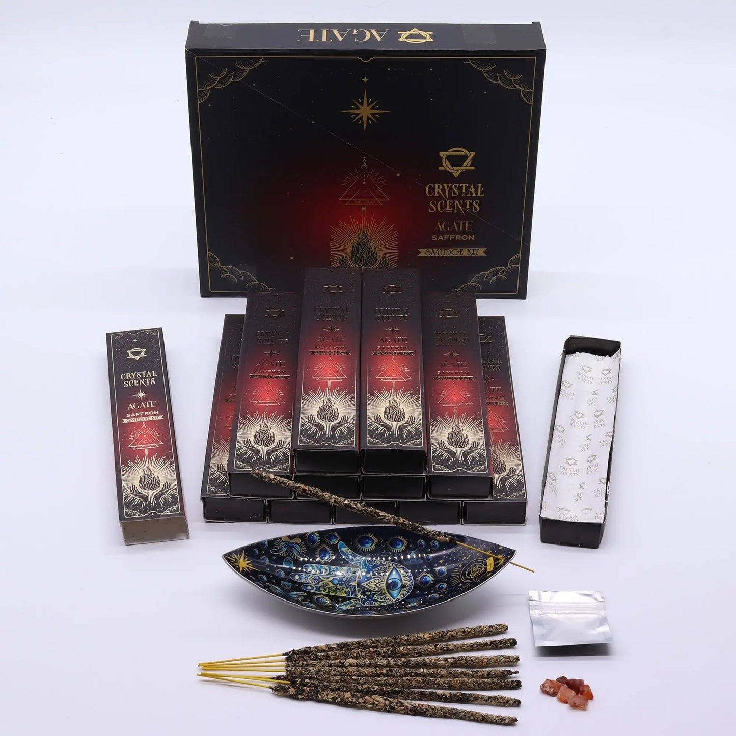 Crystal Scents incense packaging with incense sticks and accessories on a white background
