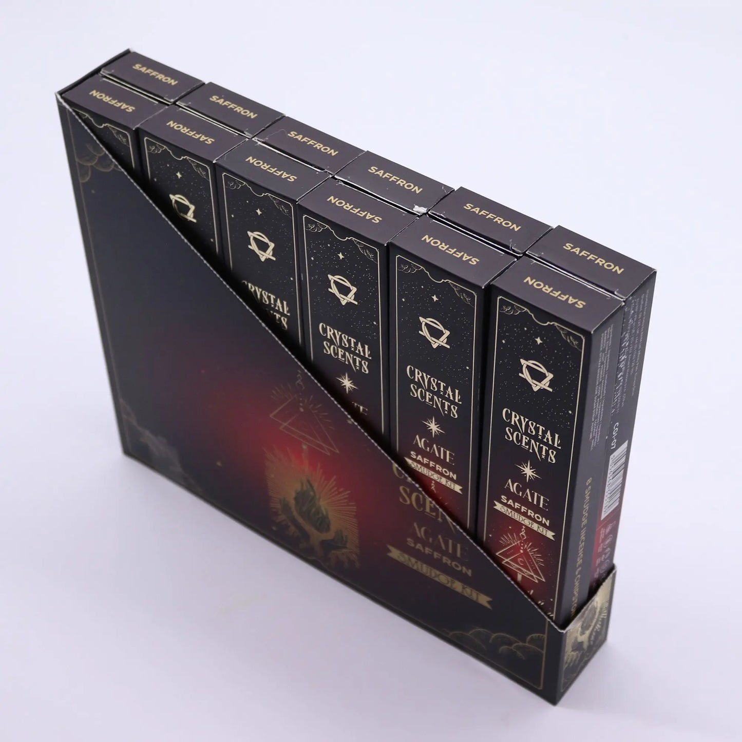 Display of 'Crystal Scents' incense boxes with a white background