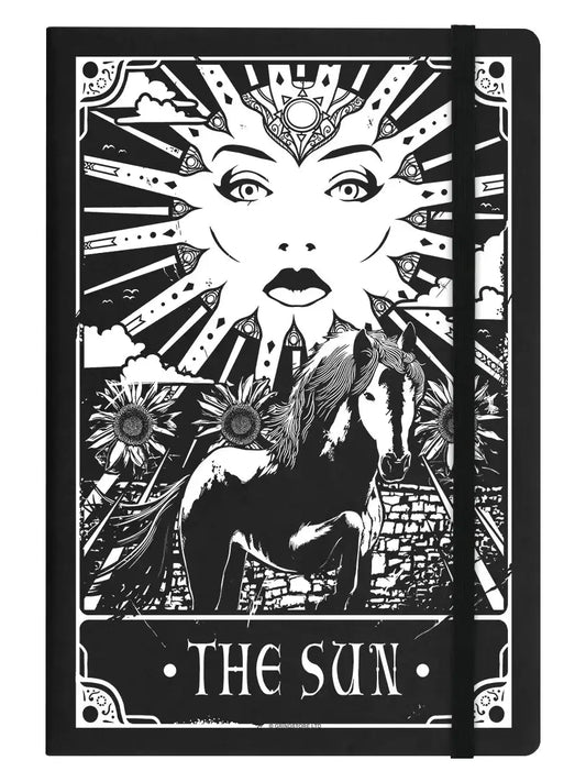 Notebook cover with black and white design of a woman, horse, and sun, labeled 'The Sun'.