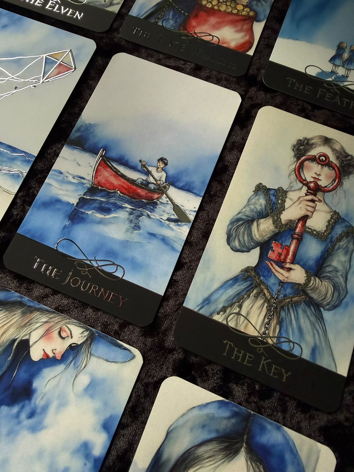 The Blue Oracle by Ukrainian artist Kateryna, companion to The Blue Tarot with blue and red artwork, silver foil and Lenormand influences.