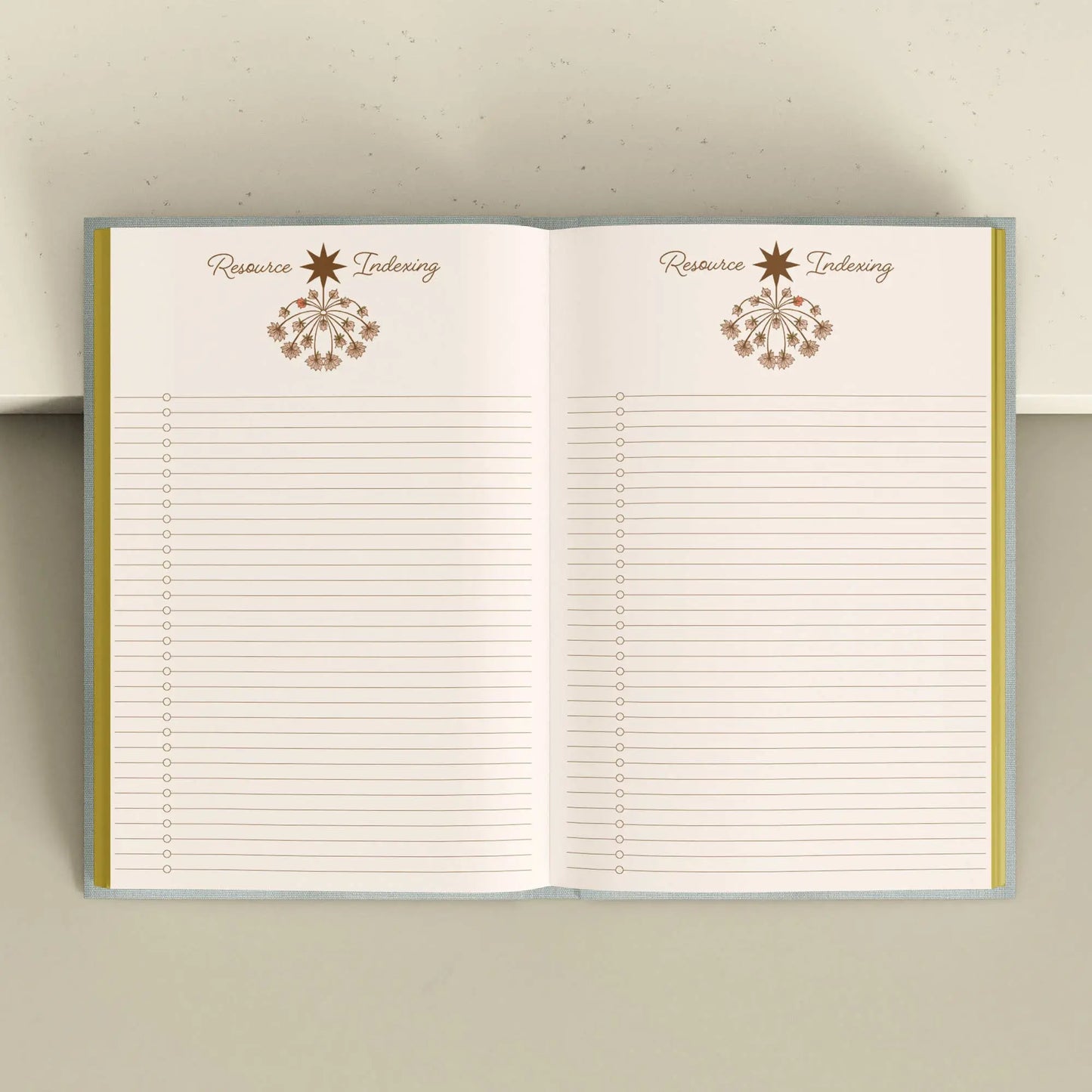 Open notebook with lined pages and decorative elements on a neutral background Crystal companion journal by Bouchette and Co available from Oneness Emporium