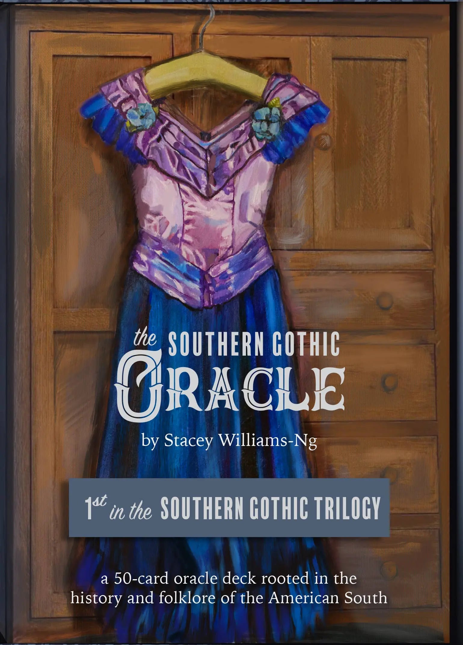 Oralook with purple and blue design on a wooden surface, labeled 'The Southern Gothic Oracle' by Stacey Williams-Ng.