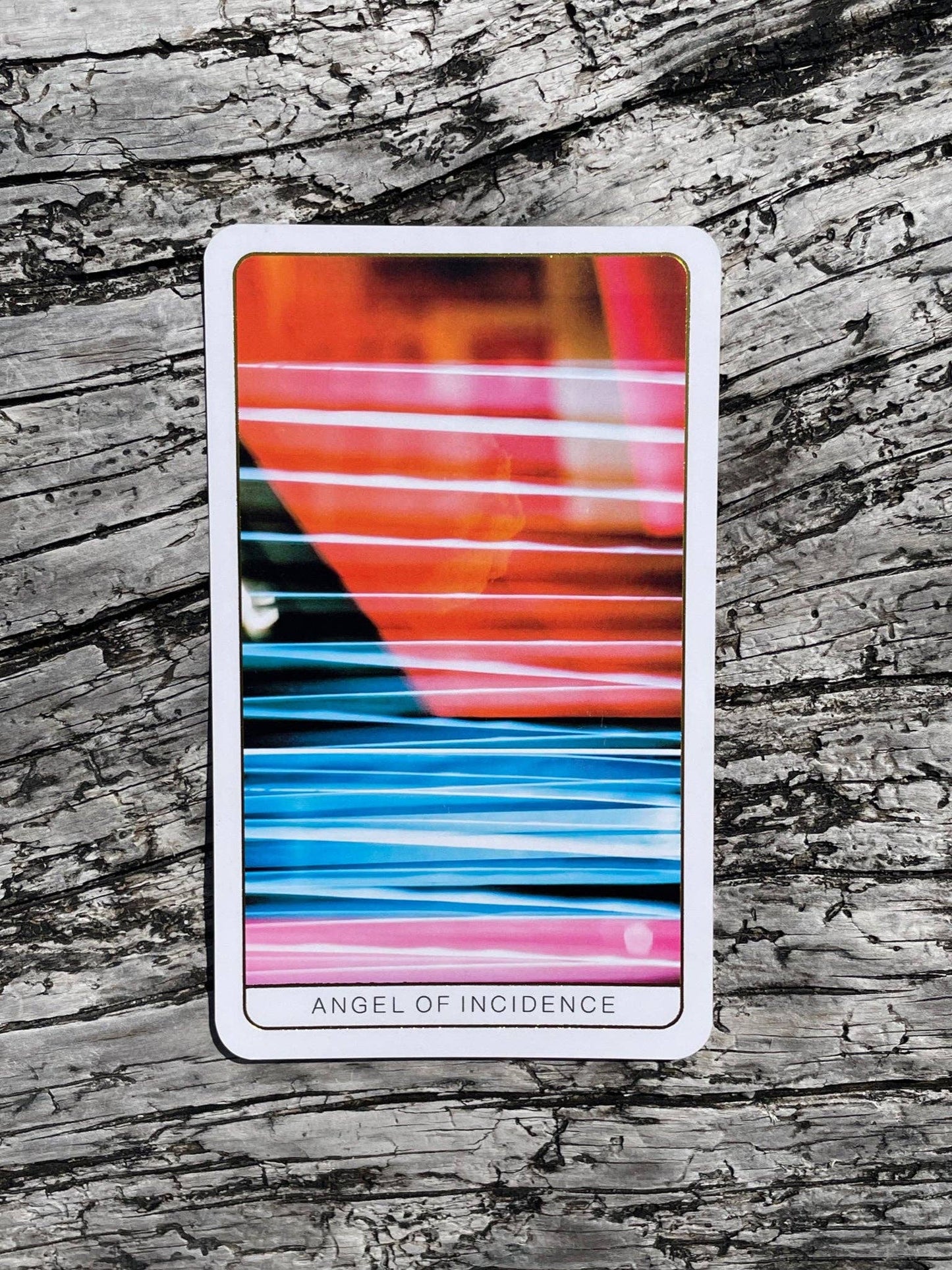 Death Doula Oracle Cards featuring original analogue 35mm photography with double exposure imagery, gold gilded edges and a guidebook for spiritual transformation and healing.