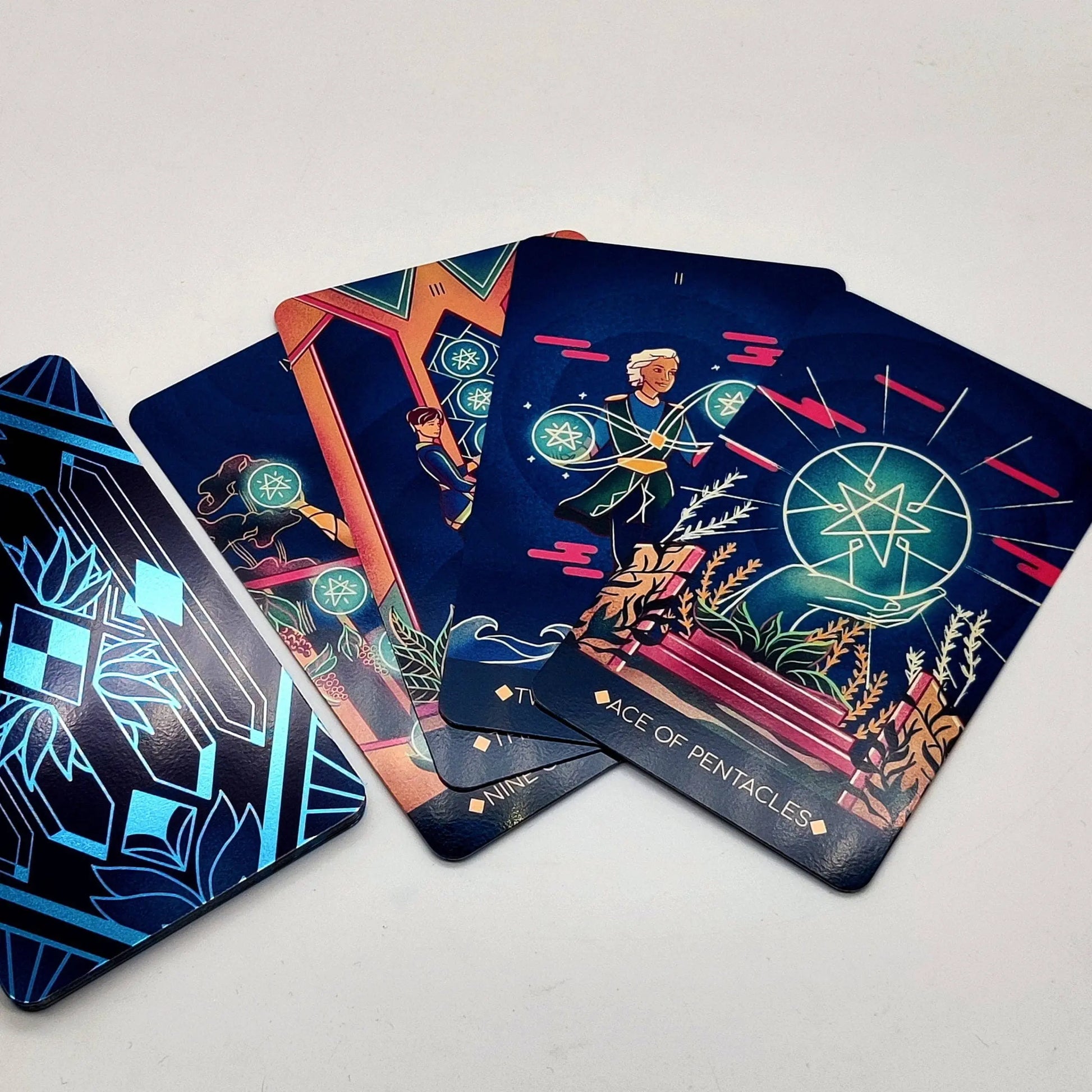 Set of tarot cards with colorful designs on a white background