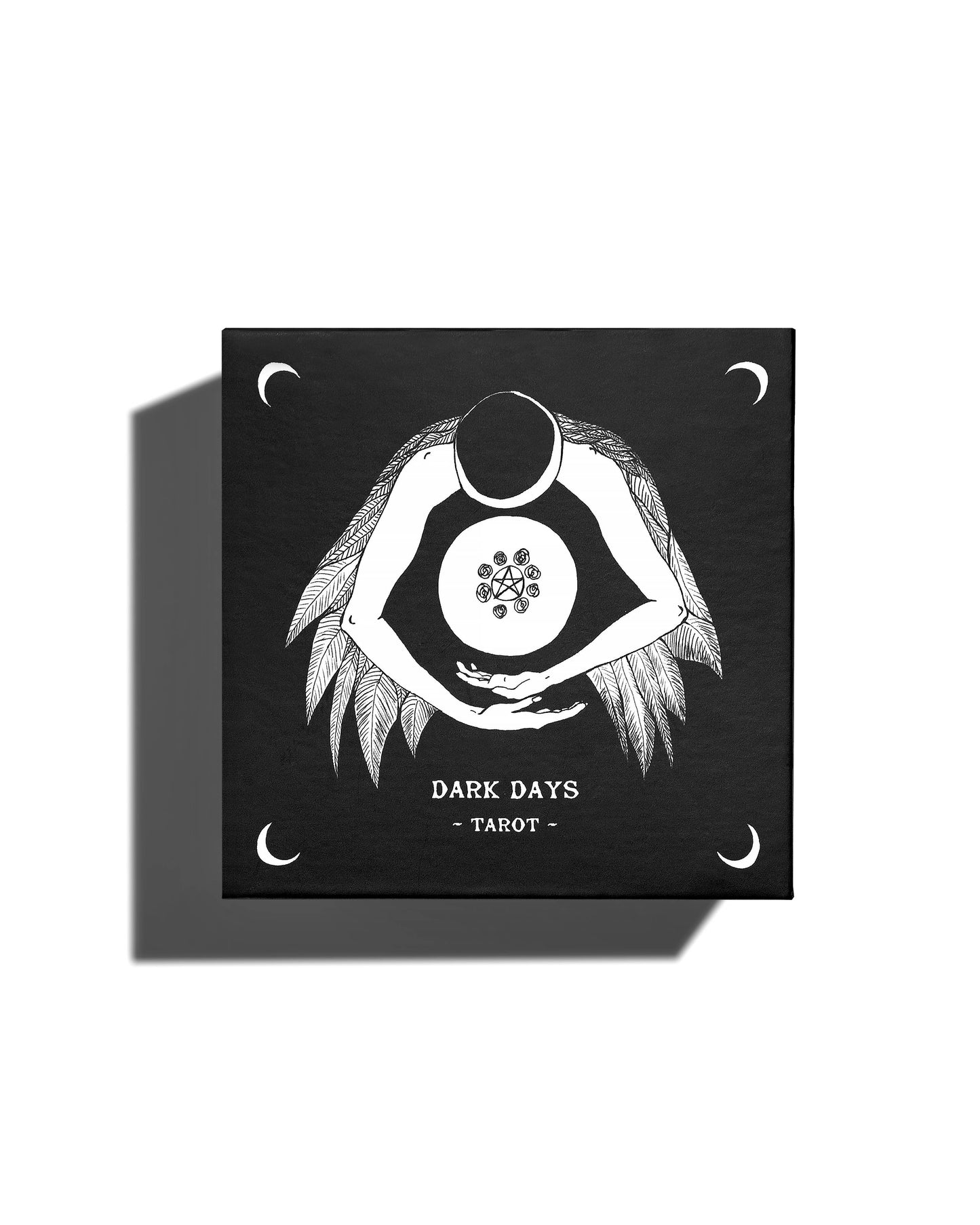 Black and white tarot card design with a central figure and 'Dark Days Tarot' text on a black background. Dark Days Tarot by Wren McMurdo Brignac featuring square black-and-white tarot cards inspired by the lunar cycle with a 180-page guidebook and collector's box.