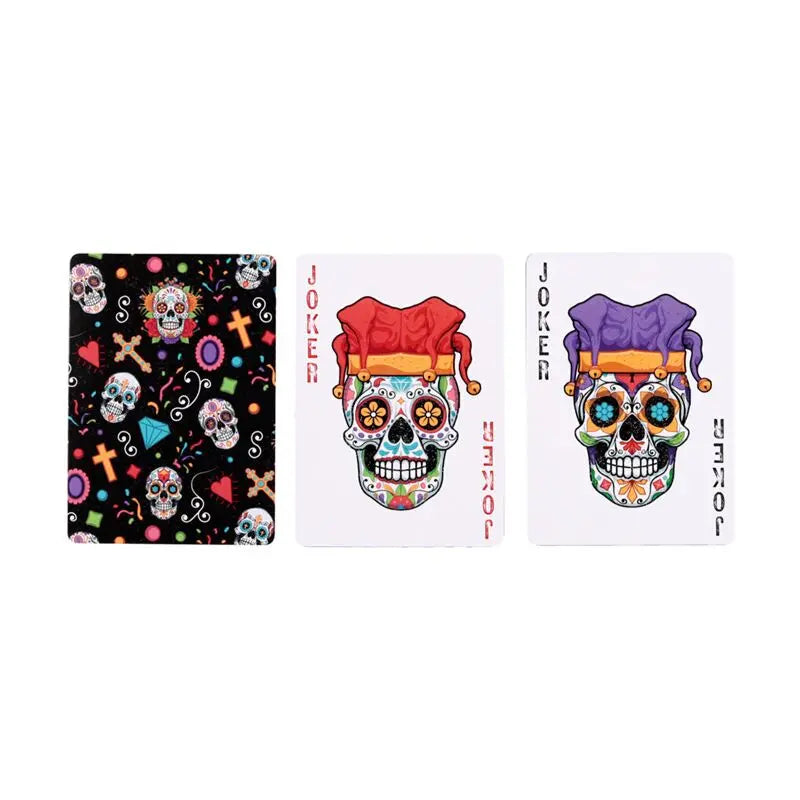 Three playing cards with colorful skull designs and Joker illustrations on a white background.