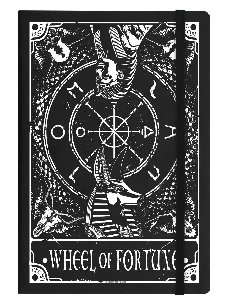 Notebook cover with 'Wheel of Fortune' design featuring black and white illustrations on a black background.