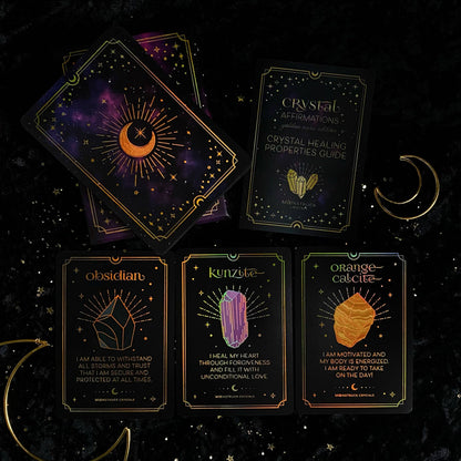Set of tarot cards with crystal healing properties on a dark background Gold Crystal Affirmations Golden Aura Edition featuring luxury affirmation cards inspired by crystal wisdom, mindfulness, and positive daily intentions.