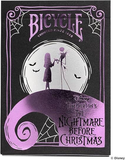 Bicycle card packaging featuring 'The Nightmare Before Christmas' design with a silhouette of a girl and a pumpkin king.