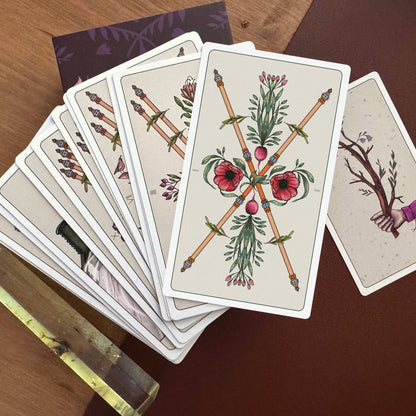 Metanoia Marseille Tarot 3rd Edition by Kerri Snook featuring vibrant botanical Marseille tarot artwork