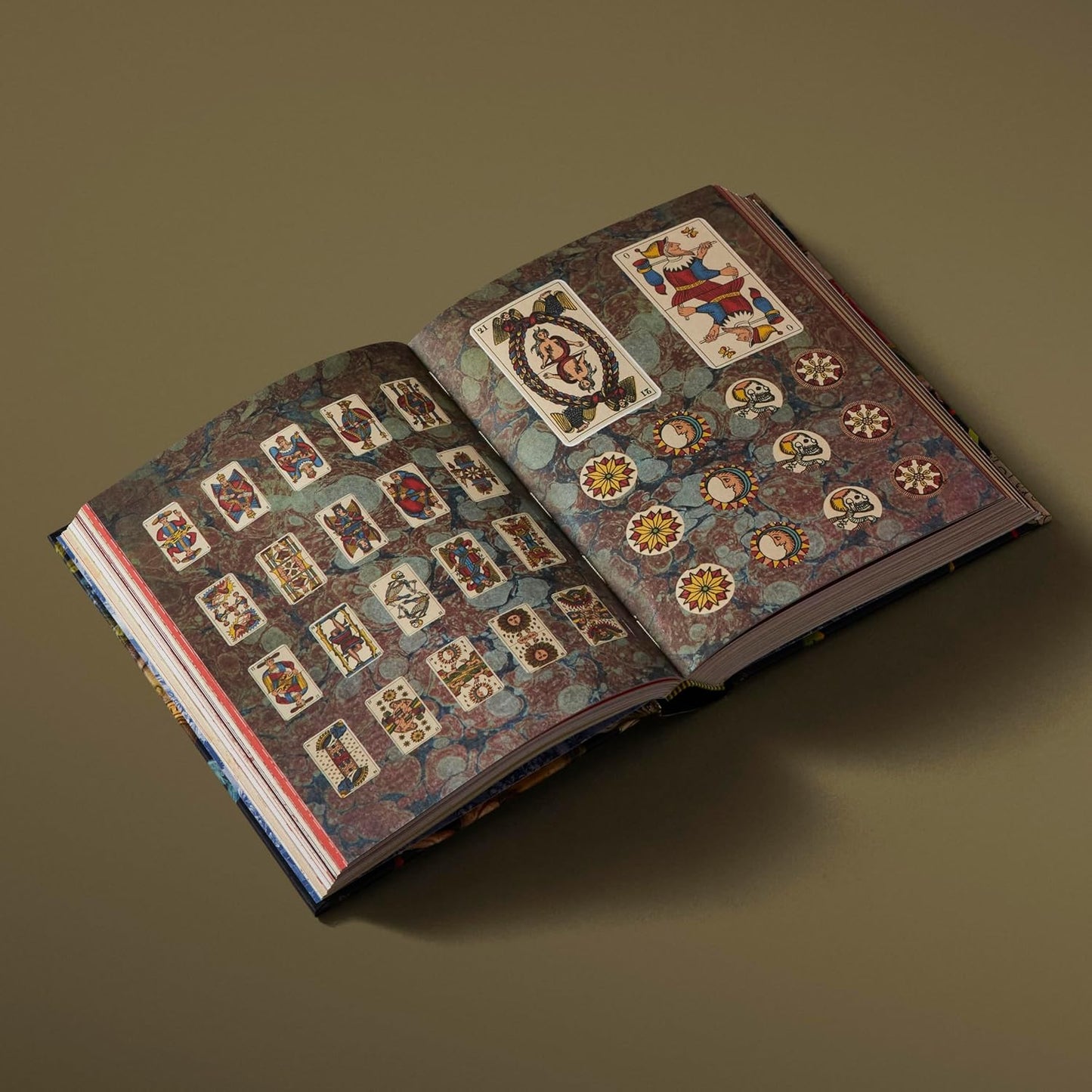 Open book with decorative pages on a brown background Esoterica sticker book