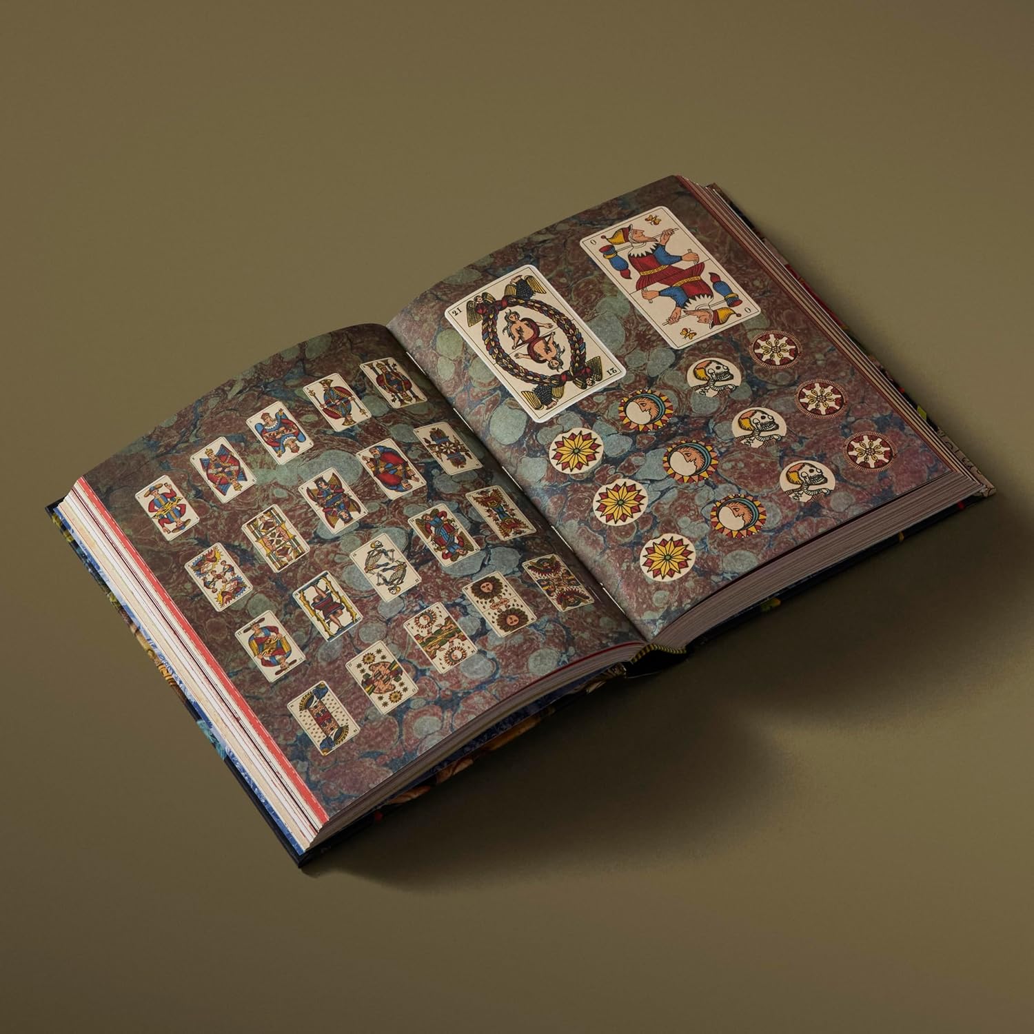 Open book with decorative pages on a brown background Esoterica sticker book