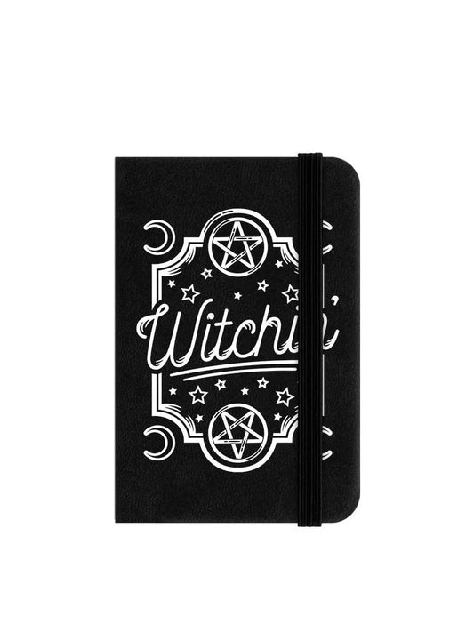 Black notebook with 'Witchin' pentagram design on a white background