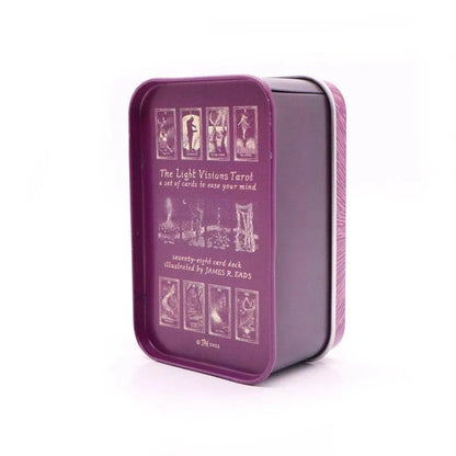 Purple tin box with tarot card illustrations on a white background