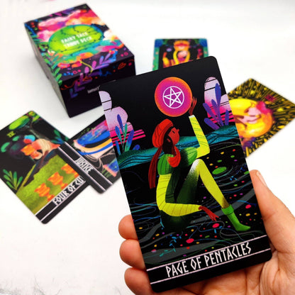 Colorful tarot cards with a focus on 'Page of Pentacles' card held by a hand, with other cards in the background.