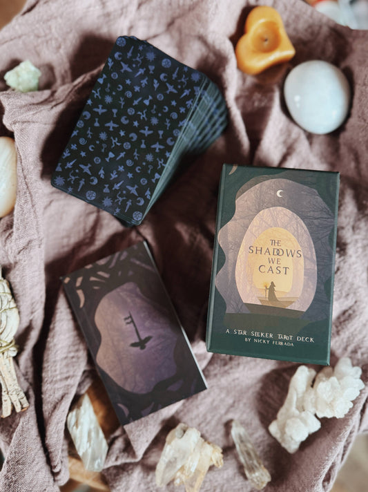 Shadows We Cast Tarot deck by Nicky Ferrada indie tarot with emotional artwork and shadow work theme
