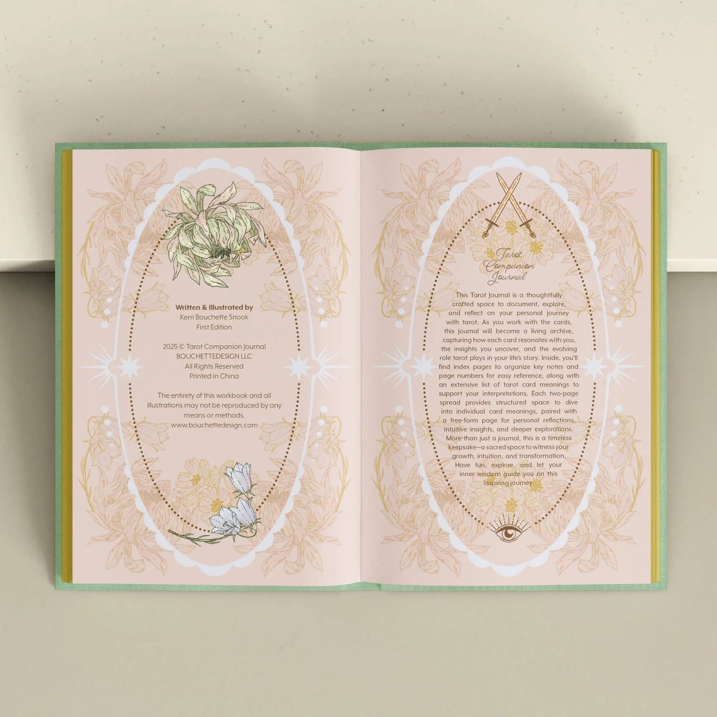 Open book with decorative pages featuring text and illustrations on a light background Tarot Journal Bouchette and Co Oneness Emporium