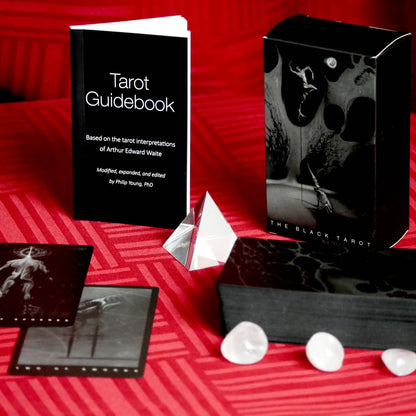 Black Tarot deck with minimalist black and white design and 78 tarot cards