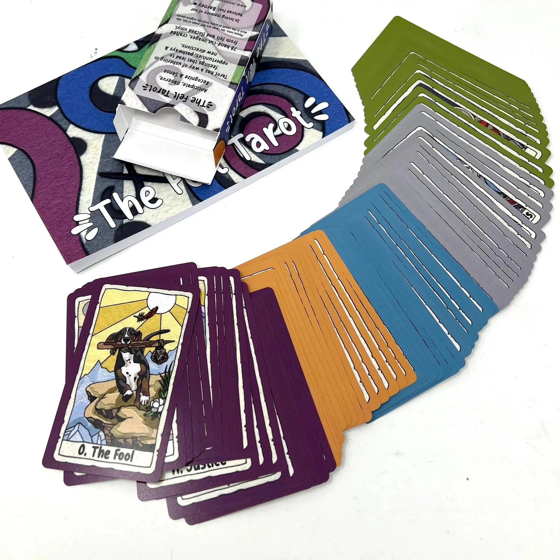 Collection of tarot cards with colorful backs on a white background