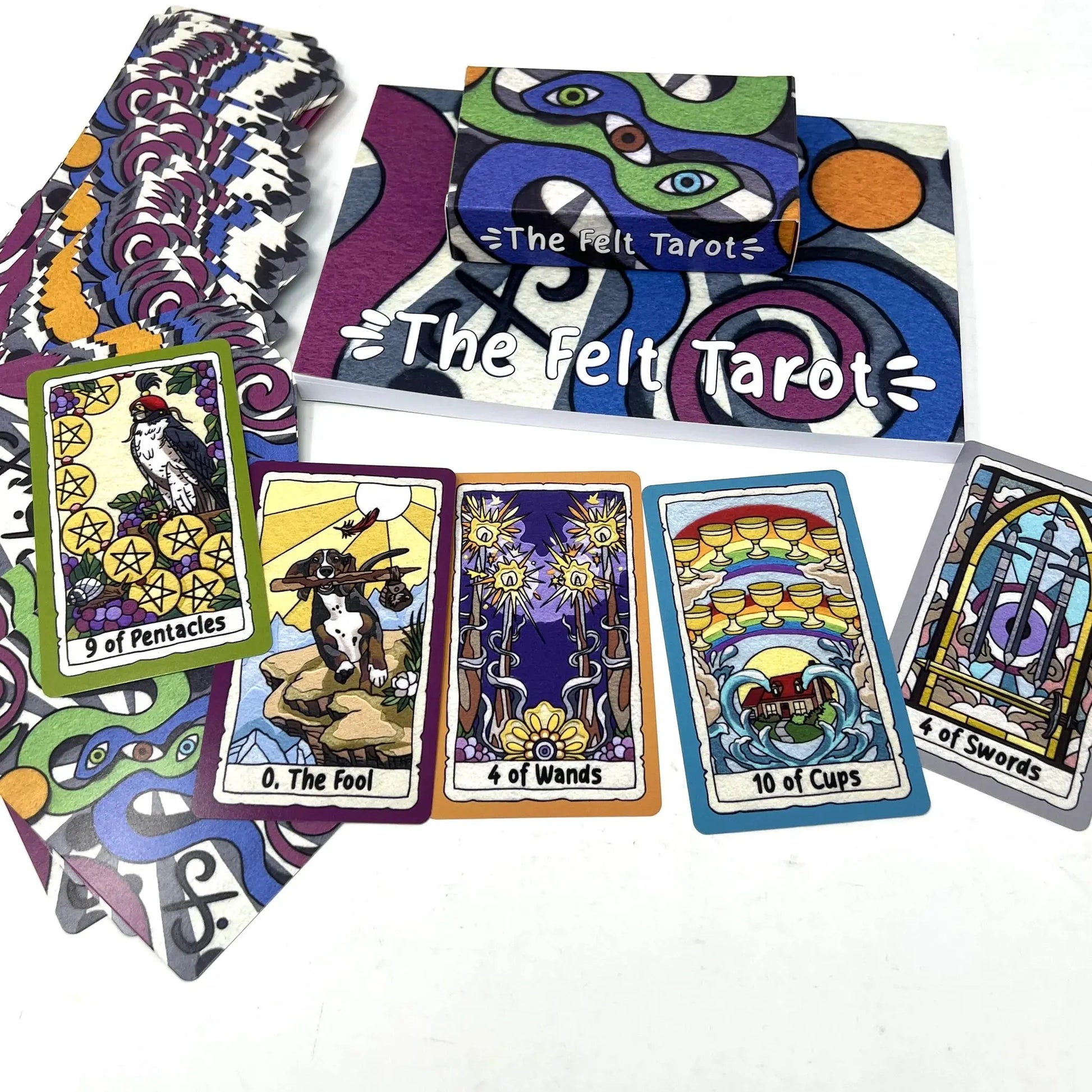 Colorful tarot cards from 'The Felt Tarot' on a white background