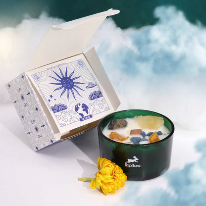 Hop Hare Sun crystal candle with citrine, sodalite gemstones and dried flowers.
