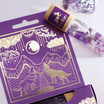 Hop Hare Moon essential oil roll-on with amethyst gemstone for relaxation and calm.