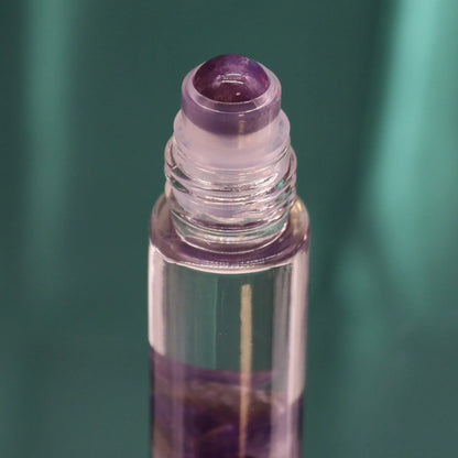 Hop Hare Moon essential oil roll-on with amethyst gemstone for relaxation and calm.
