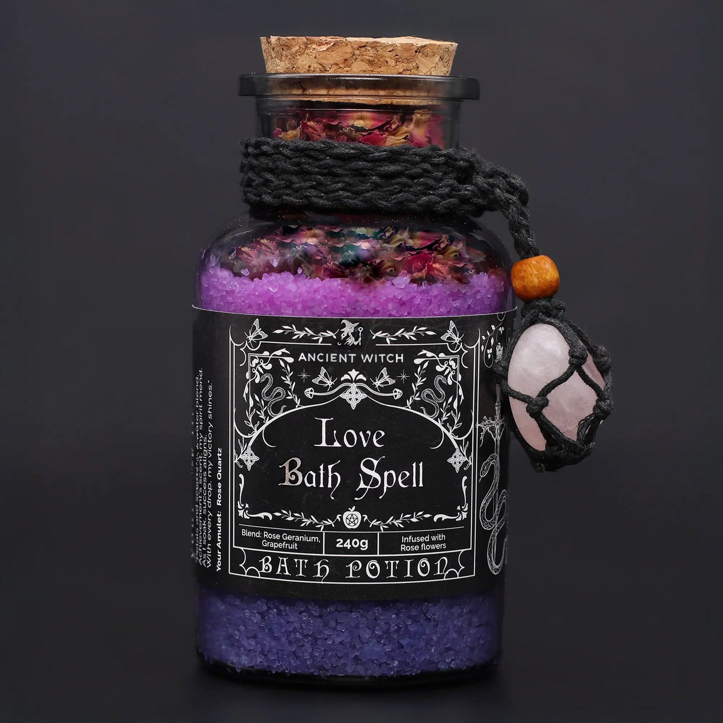 Bath potion bottle labeled 'Love Bath Spell' with decorative elements on a dark background