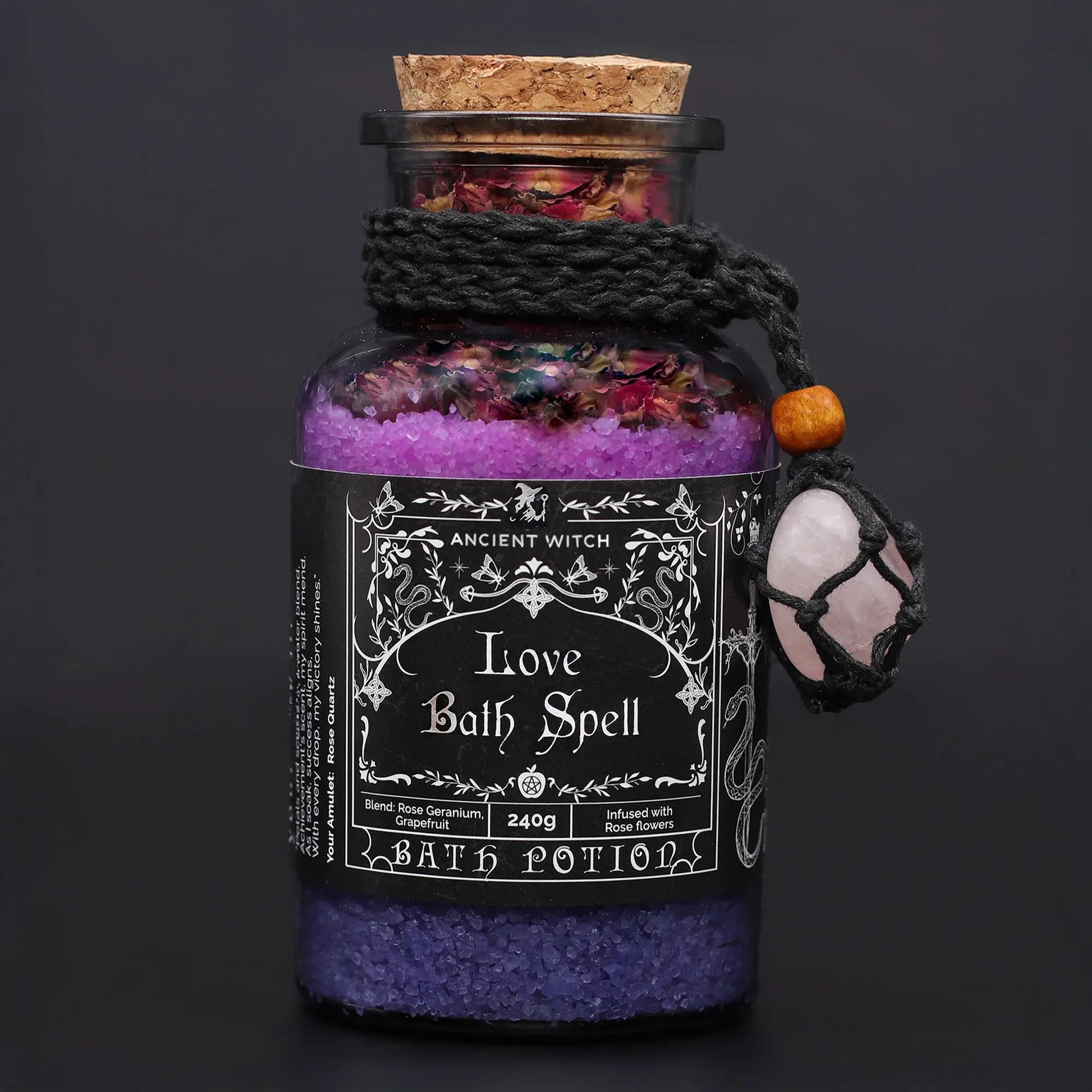 Bath potion bottle labeled 'Love Bath Spell' with decorative elements on a dark background