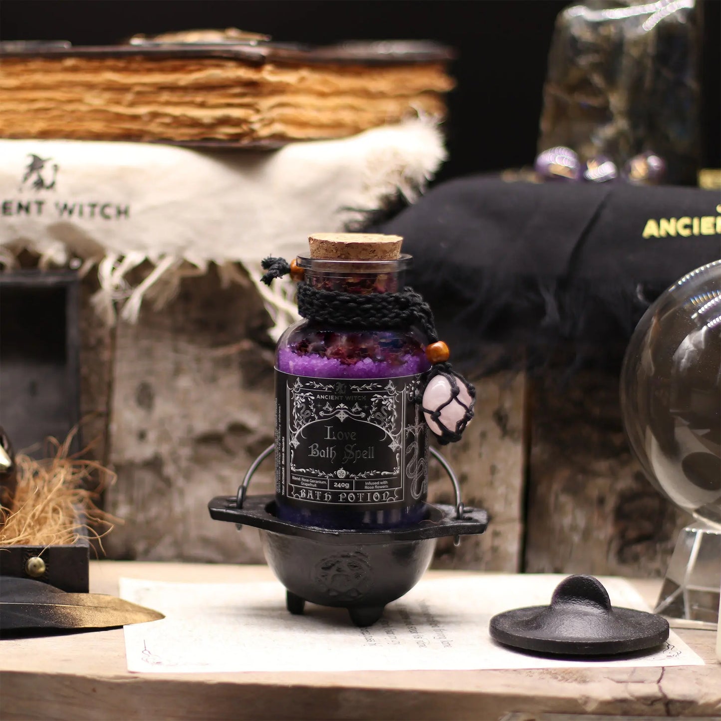 Purple potion bottle with black label on a wooden surface with mystical background