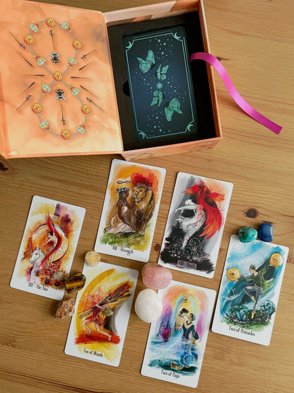 Luminous Flow Tarot first edition deck with watercolor artwork and gold detailed box.