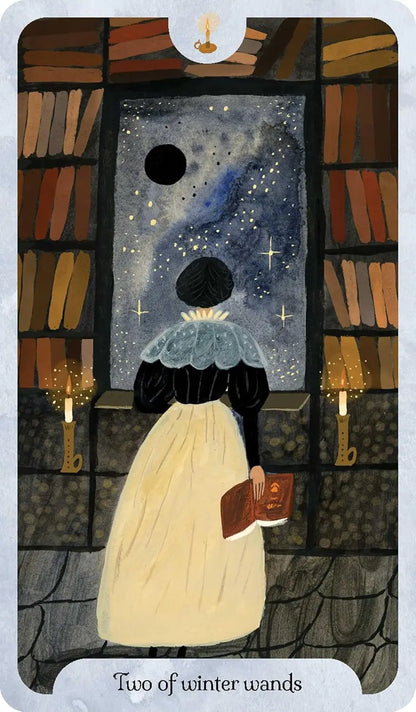 Two of wands Seasons of the Witch Winter Tarot by Lorriane Anderson featuring beautiful winter-inspired artwork celebrating Yule, Imbolc, and the Wheel of the Year.