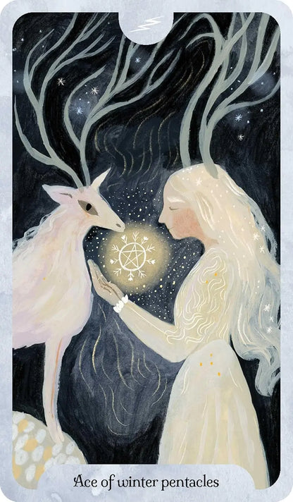 Seasons of the Witch Winter Tarot by Lorriane Anderson featuring beautiful winter-inspired artwork celebrating Yule, Imbolc, and the Wheel of the Year. Ace of Pentacles