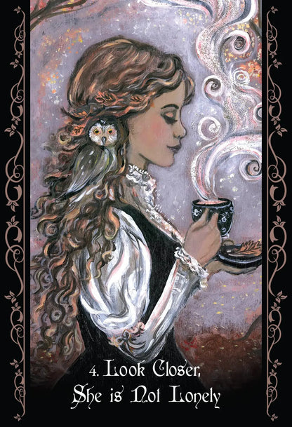 The Solitary Witch Oracle deck by Lucy Cavendish with mystical nature-inspired artwork and guidebook.